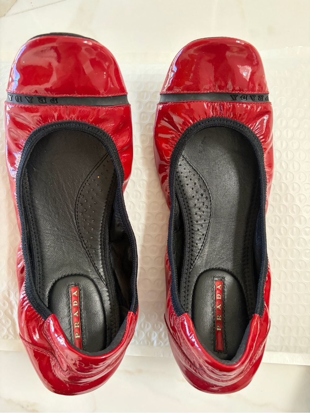 Prada Red Patent Leather Ballet Flats with Black Trim